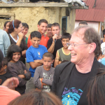 Geof Morgan in a crowd of people